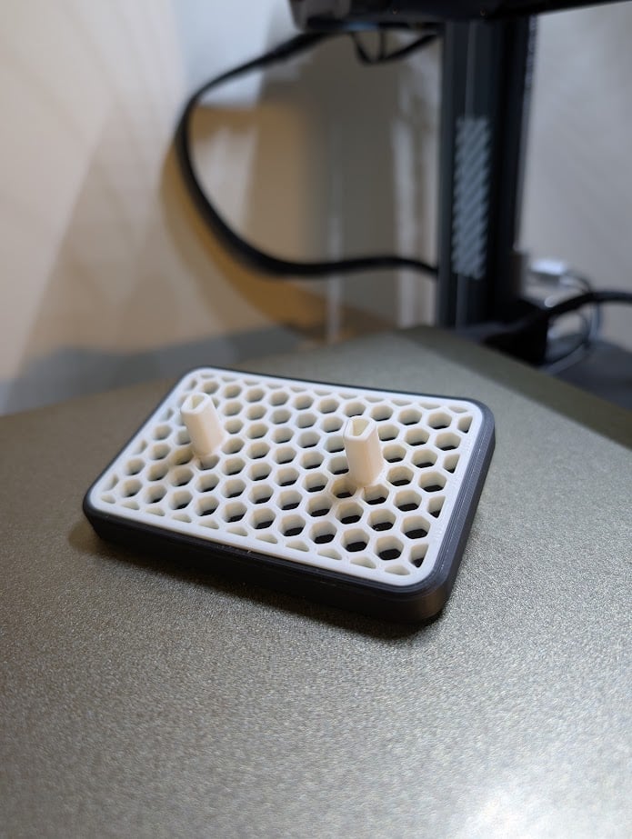 Black and white honeycomb 3D printed toothbrush stand